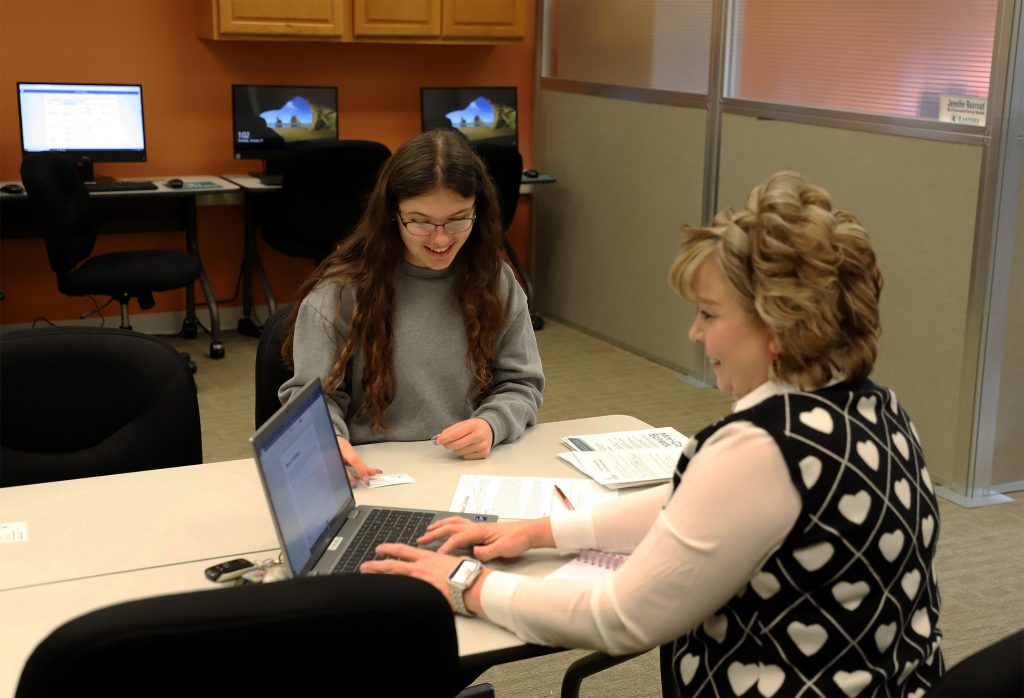 Career counselor and student working