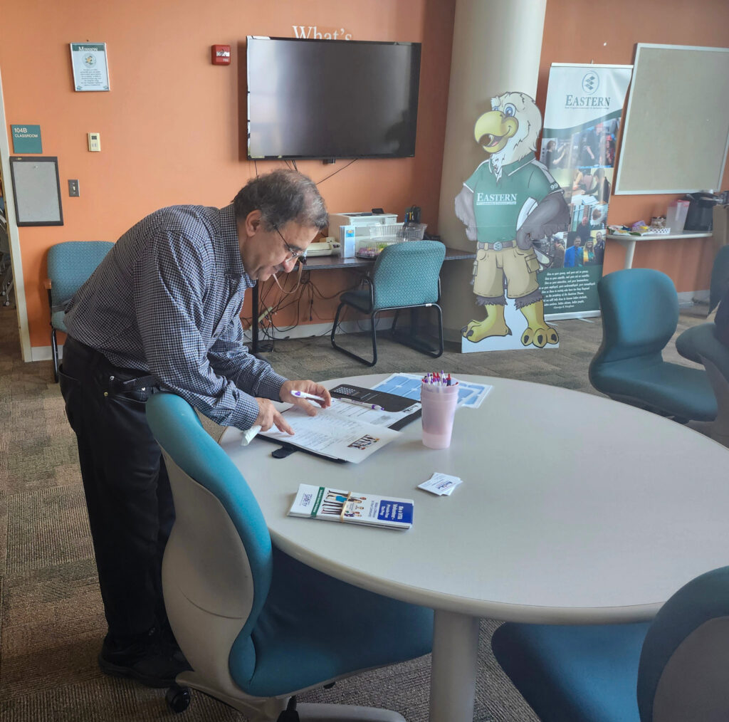 man looking through papers